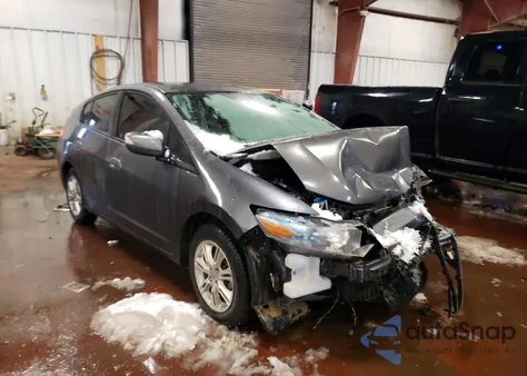 2011 Honda Insight Ex z USA, uszkodzony, nr VIN JHMZE2H74BS004127